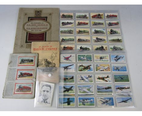 A folder of cigarette cards including locomotives and the 1937 coronation 