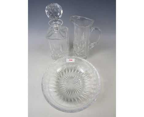 Three pieces of cut crystal including a bowl, a decanter and a jug