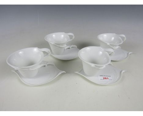 Four Franz boxed cabinet cups and saucers