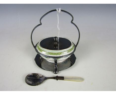 A late 19th / early 20th Century electroplate mounted porcelain preserve dish, and spoon  