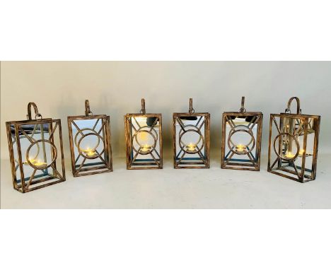 WALL HANGING CANDLE LANTERNS, a set of six, French Art deco style, mirrored back plate detail, 43cm x 22cm x 11cm. (6) 