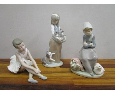 Two Lladro porcelain figurines, one depicting a girl with cats, the other a woman with a duck and ducklings, and a Nao figuri