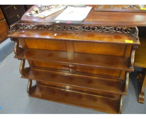 A Victorian mahogany graduated wall shelf 