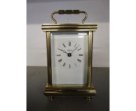 An Angelus key-wound five-window brass carriage clock 