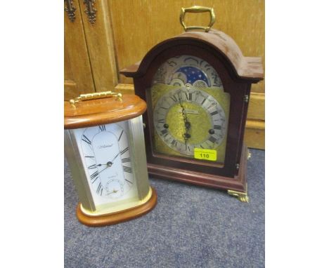 A reproduction mahogany cased moon-phased bracket clock and a Whittall mantel clock 