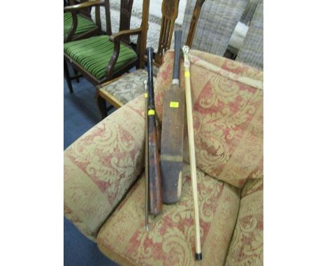 A Ceylon Planters Rifle Corps swagger stick, an Elizabeth II walking cane with Royal Military Police badge, a vintage America