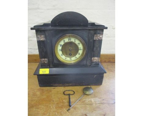 A black slate mantel clock, with key and pendulum 
