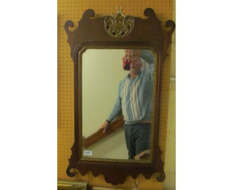 A Georgian style mahogany shaped framed mirror