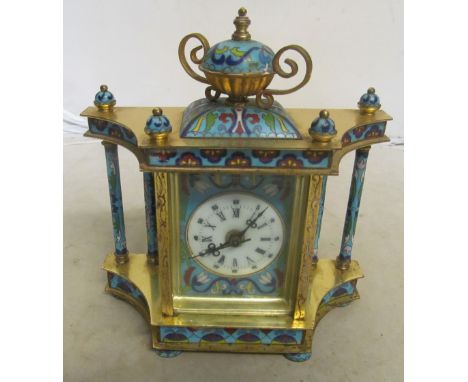 A modern battery operated gilt and cloisonné clock with portraits of ladies