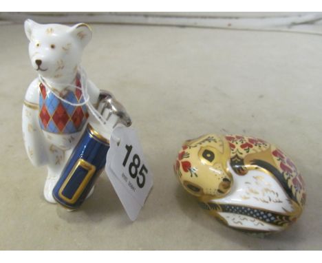 A Royal Crown Derby dormouse with silver button and a golfing bear no button