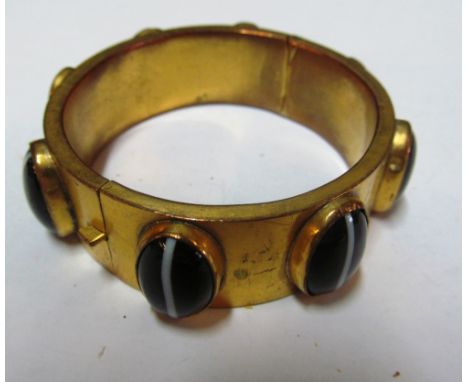 A narrow bangle set agate