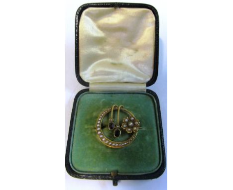 A 15ct circular Edwardian seed pearl and amethyst brooch