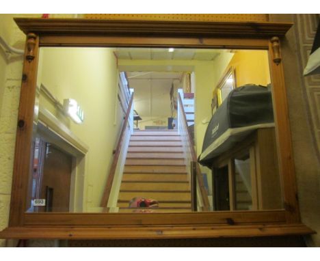 A pine overmantel mirror