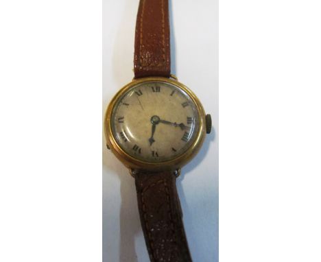 A vintage gent's watch in gold case