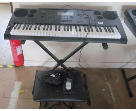 A Casio CTK - 6200 keyboard