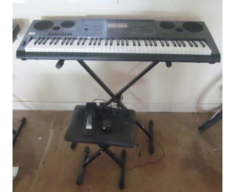 A Casio WK - 7600 keyboard