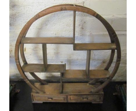 An oriental circular shelf unit