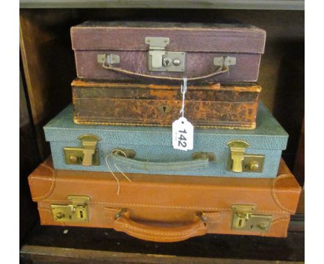 Four small vintage cases