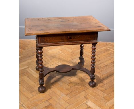 A William and Mary oak side table, with boxwood inlaid detail, fitted a single frieze drawer, raised on bobbin turned support