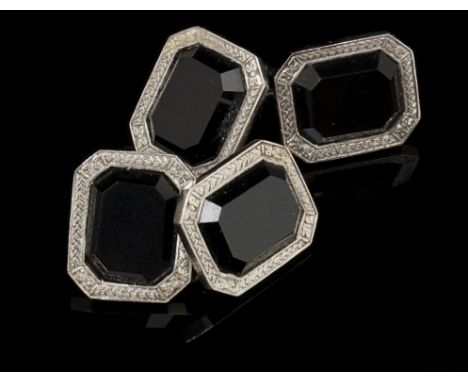 A pair of French gold and onyx cufflinks, the rectangular cut-cornered onyx panels in engraved mounts, poinçon marks to rever