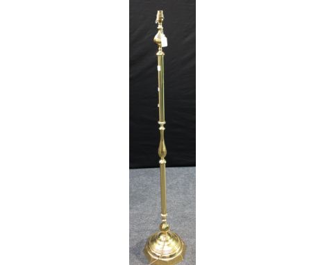 A 20th century brass standard lamp, with knopped column on stepped octagonal foot