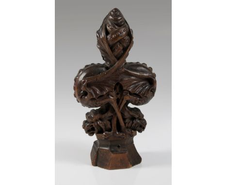 A 19th century carved deal 'Wyvern' pew-end finial, with twin entwined mythical beasts, 30cm high