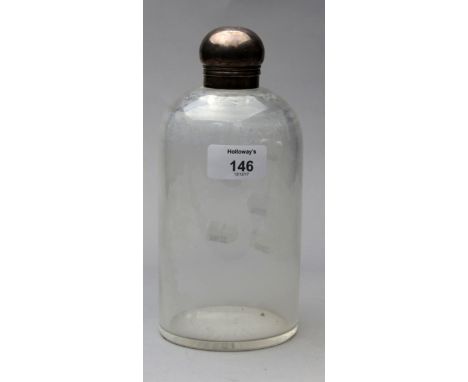 A late 19th century silver mounted glass flask, of cylindrical form, with a bayonet and hinged mushroom cap, London 1877, 21c