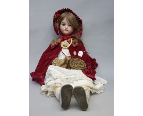 An early 20th century Simon Halbig Kammer Reinhardt 80cm doll,  the bisque head with sleeping eyes, open mouth and pierced ea