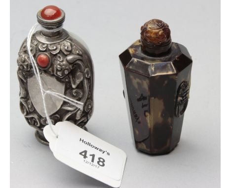A Tibetan-style silver and coral mounted Chinese snuff flask, and one other in tortoiseshell,8 and 7.5cm