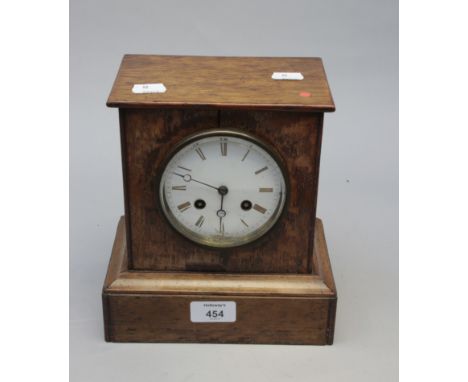 Henry Marc, Paris, a late 19th century oak cased mantel clock, the square section case enclosing an eight day bell striking m