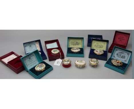 A collection of nine Bilston Battersea enamel/Halcyon Days Christmas pill boxes, late 1970s and early 1980s, each boxed