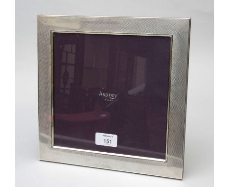 Asprey, London, a silver photograph frame, rectangular with engine turned decoration, 20 x 20cm internally, 25.5 x 25.5cm ext