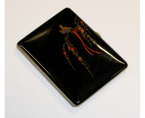 A Japanese black lacquered and overlaid cigarette case, Taisho Period, the hinged front decorated with perched exotic birds, 