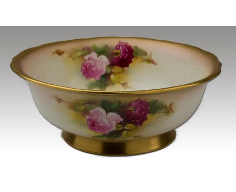 An early 20th century Royal Worcester porcelain fruit bowl, painted with cabbage roses by Ethel Spillsbury (signed), 23cm dia