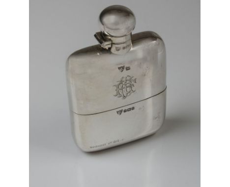 G and J. W. Hawksley, a silver hip flask with mushroom bayonet hinged cap and gilded cup, bears monogram and date November 11