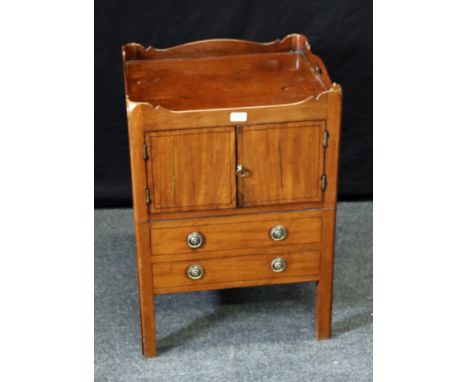 A George III mahogany tray top night commode with pull-out base and two cupboard doors