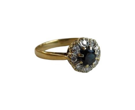 9 CARAT YELLOW GOLD SAPPHIRE AND DIAMOND RING WITH 0.25 CARAT OF DIAMONDS 