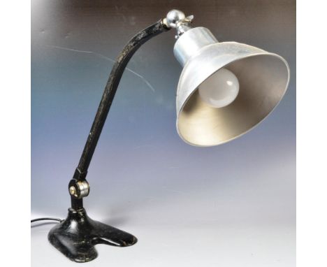 A retro vintage 1940's French Industrial factory work desk lamp light having an enamel pendant shade raised on cast metal bla