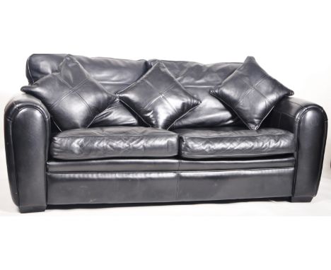 Duresta - Spitfire - A 20th Century designer two seater sofa settee having thick cushioned back and seat rests with barrel ar