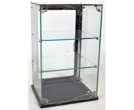 A vintage 20th Century Art Deco shop advertising glass vitrine display cabinet. The case being a counter top display of small