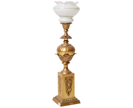 A retro vintage 20th Century Hollywood Regency Neoclassical brass metal table lamp light of large upright form having a opali