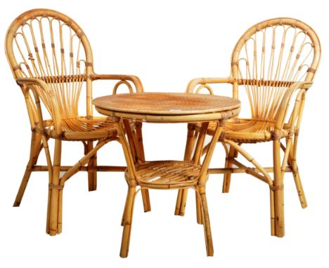 A matching pair of retro vintage 20th Century&nbsp;Italian bamboo and wicker / cane armchairs together with a matching table 