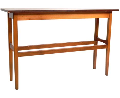A retro vintage 1960's Danish teak wood console table / side occasional table of rectangular form having a shaped table top r