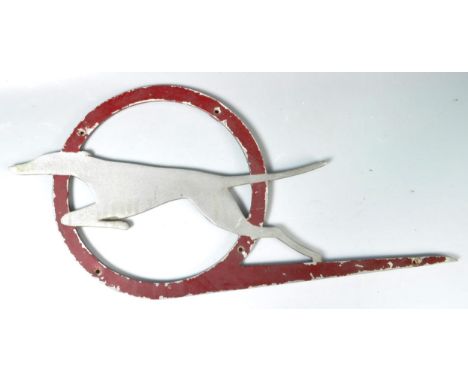 An original vintage 1950's metal advertising point of sale motoring transport related sign for Greyhound buses / lines featur