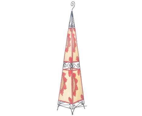 A retro mid 20th Century Moroccan floor standing lamp light of teepee form having a scrolled ebonised metal frame with painte
