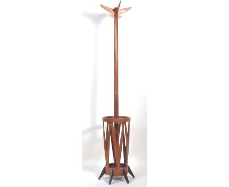A retro vintage mid 20th Century wooden atomic coat stand having a formed four hook top with centre turned cylindrical column