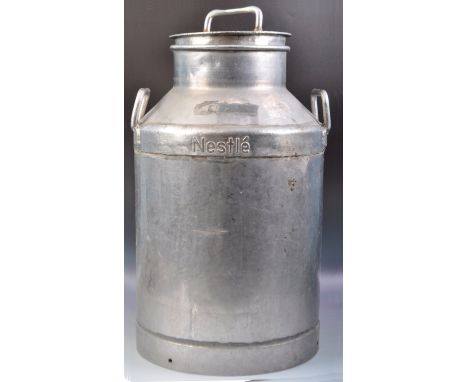 Nestlé - A retro vintage mid 20th Century advertising point of sale shop display galvanised milk churn of typical cylindrical