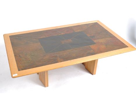 A vintage 20th Century South African cherry wood and slate coffee table / centre occasional table. The table having a thick a