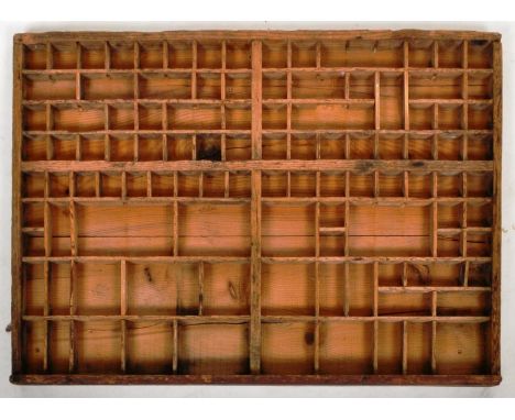 An original early 20th Century vintage wooden printers block printers tray of large size having a framed edge with various si