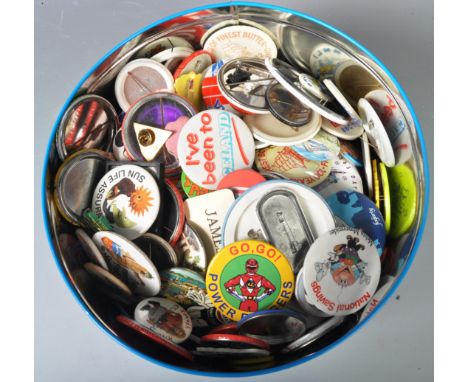 A large assorted collection of vintage and later pin badges of varying subjects and sizes to include Led Zeppelin Mirror badg